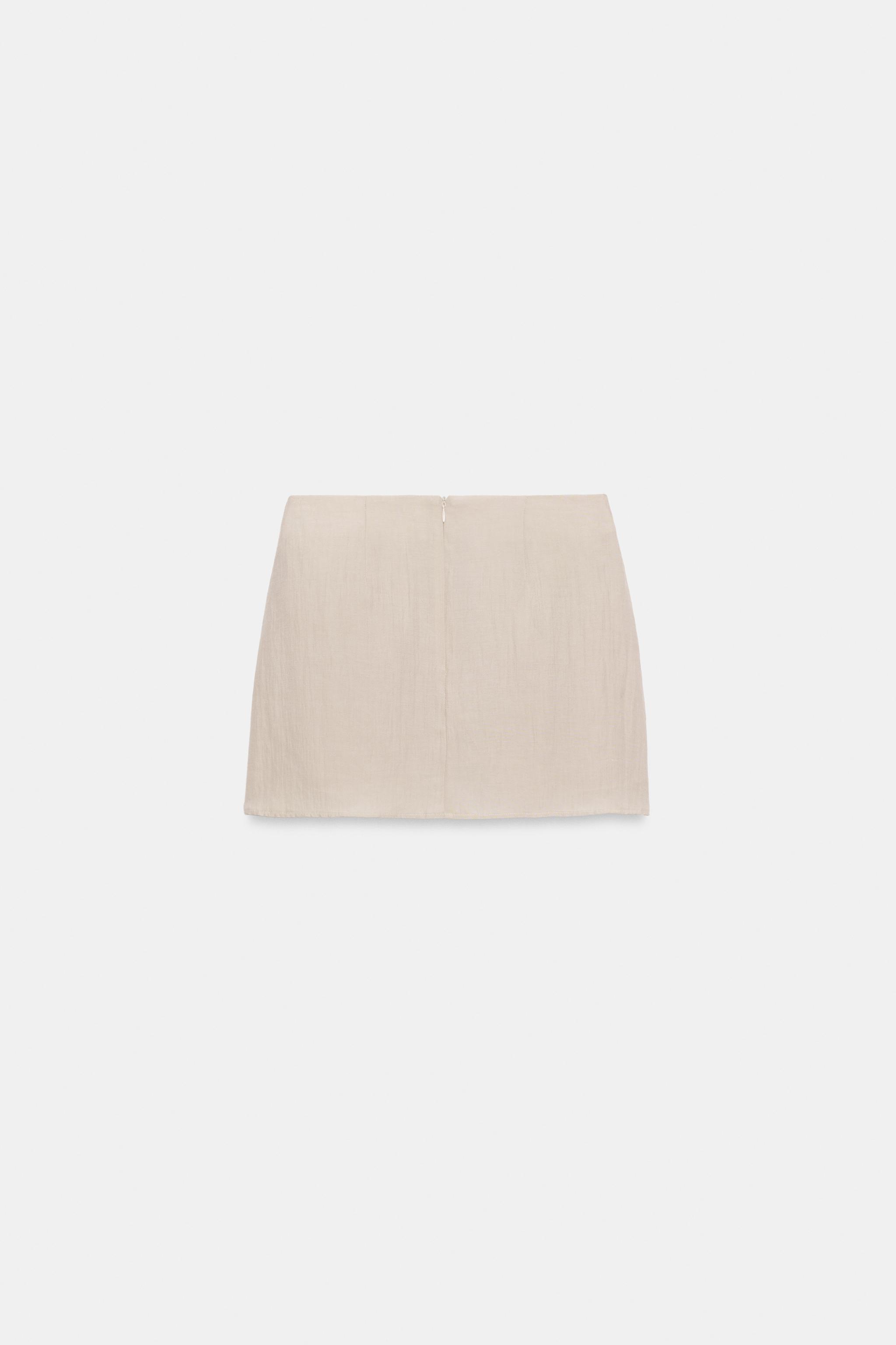 JUPE-PANTALON À NŒUD ET DENTELLE